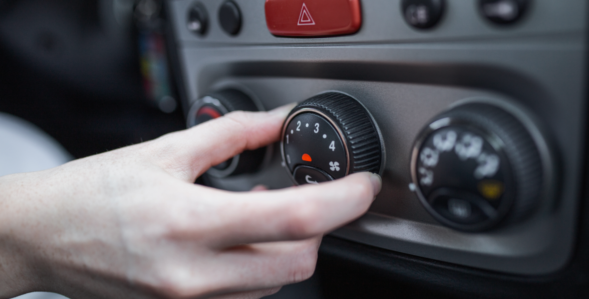 woman-hand-turning-car-air-conditioning-system-car-air-conditioner-off-button-close-up-view 1 (1)